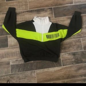 It is dark green, light green and white quarter zip.